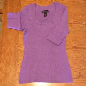 Purple top in excellent pre-owned condition.
